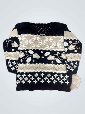 Schwarzer, beige und weiß gemusterter Pullover