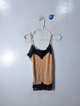 Womens beige camisole with black lace trim