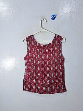 Red Sleeveless Top with White Pattern