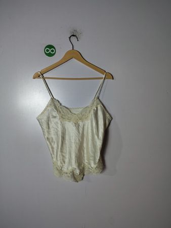 Cream-colored camisole with lace trim