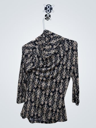 Black and beige patterned long-sleeved turtleneck
