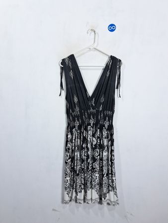 Black and white paisley print maxi dress with V-neck and tie straps