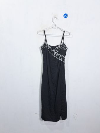 Black slip dress with white floral embellishments