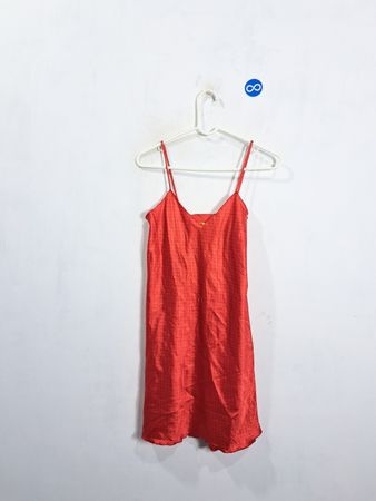Red slip dress with black polka dots