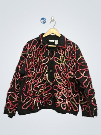 Schwarze Jacke mit mehrfarbigem Band und Pailletten
