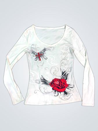 White long-sleeved shirt with butterfly and rose graphic
