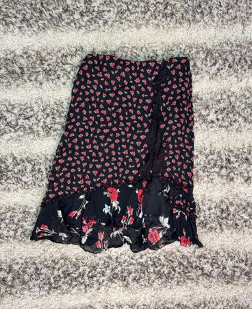 Black floral print skirt with ruffle detail