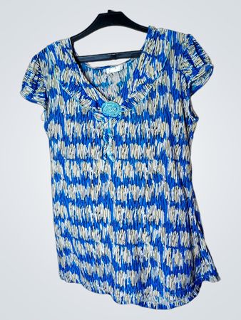 Blaue und weiße gemusterte Tunika mit Blumenakzent