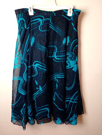 Blaue und schwarze abstrakte Druckrock