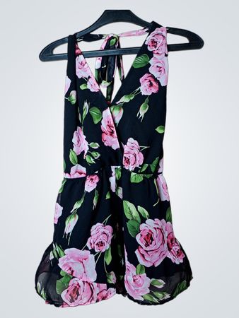 Schwarzer Blumenmuster-Halterhals-Overall