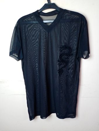 T-shirt en maille noire avec graphique de dragon