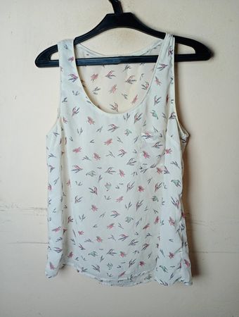 Pimkie Kollektion Weißes Ärmelloses Tanktop mit Vogelprint