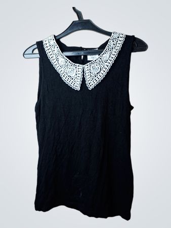 American Horror Story Schwarzes ärmelloses Top mit Häkelkragen