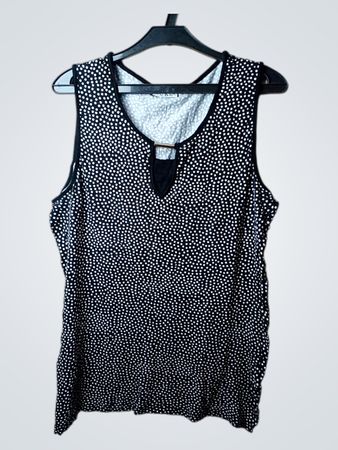 SURE Schwarzes und weißes gepunktetes ärmelloses Oberteil mit Ausschnittdetails
