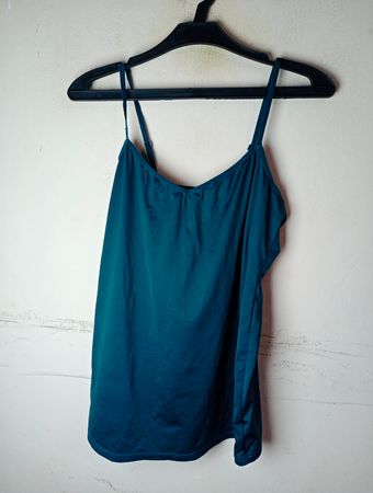 Türkisfarbene Spitze mit XL-Tag