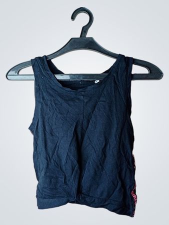 Schwarzes Tanktop mit pinkem Textdetail