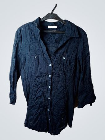 Chemise à boutons noire à col
