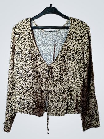 Tunique peplum à manches longues imprimé léopard
