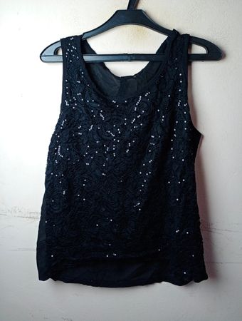 Schwarzes Top aus Spitze mit Pailletten