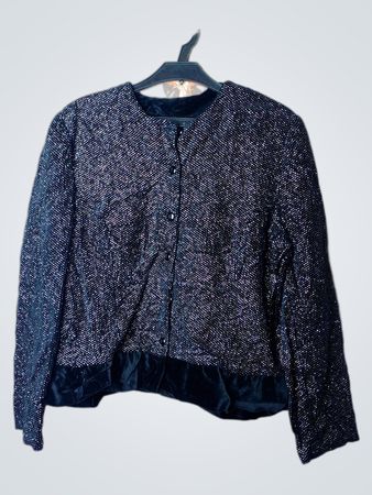 Funkelnde schwarze Jacke mit Samtbesatz