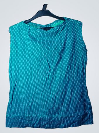 Teal ärmelloses Top mit weißen Polka-Dots