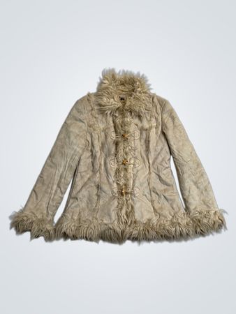 Veste beige en fausse fourrure bordée