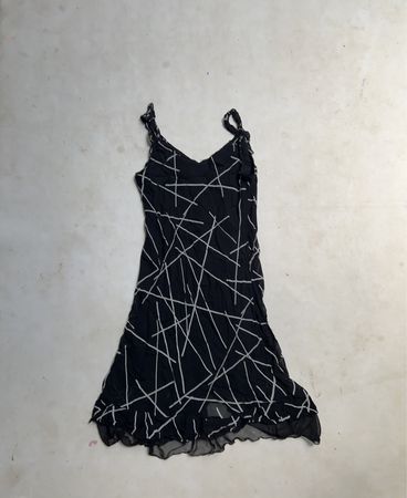 Black dress with white line pattern