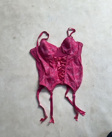 Rosa Korsett mit Strumpfhaltern