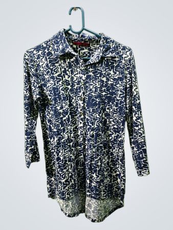 Blue and white patterned long sleeve shirt