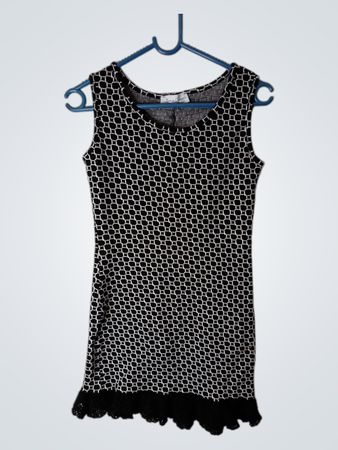 Ilana Connors ärmelloses Kleid mit geometrischem Muster und Spitzenbesatz