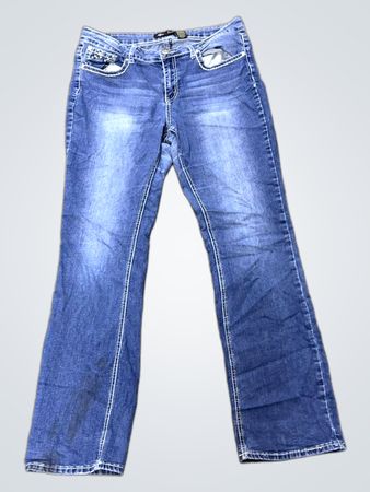 Mädchen Blaue Jeans mit verzierten Taschen