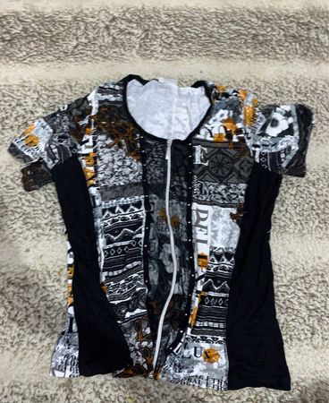 T-Shirt with Soccer Ball and Newspaper Print
