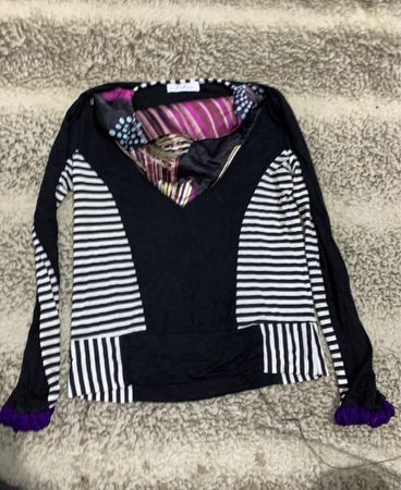 Black and White Striped Sweater with Purple Accents