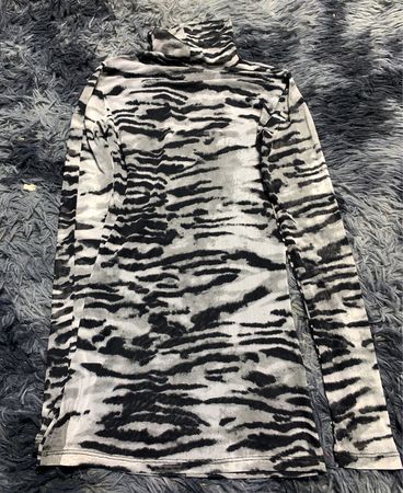 Zebra Print Turtleneck Sweater