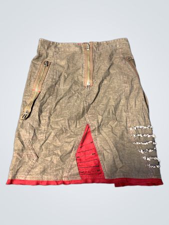 Brown skirt with red accents and frayed details