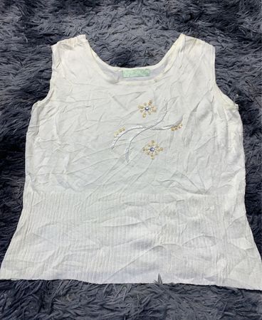 White Sleeveless Top