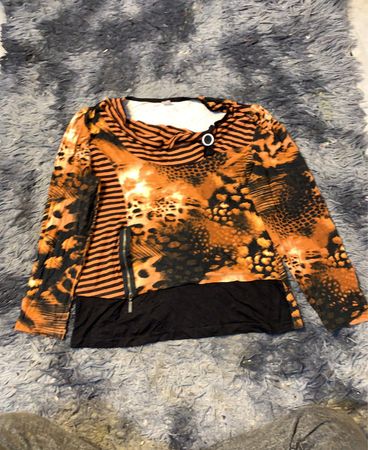 Orange-schwarzes Tierprint Langarmtop mit Reißverschlussdetails