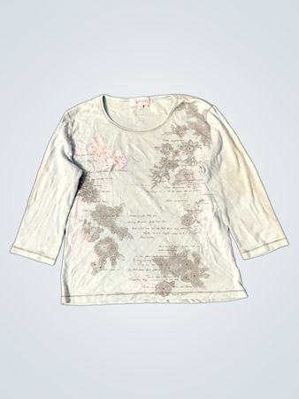 Hellblaues Langarmoberteil mit floralem Design