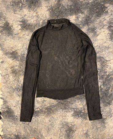 Schwarzes Netz-Turtleneck-Oberteil