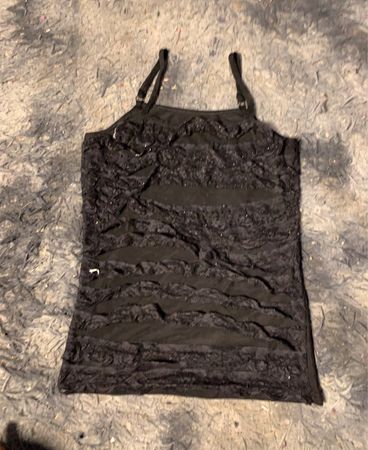 Schwarzes Kamelshirt-top