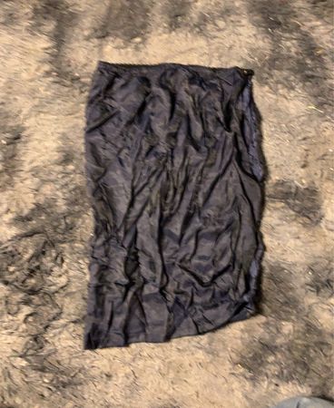 Schwarzes Kleidungsstück