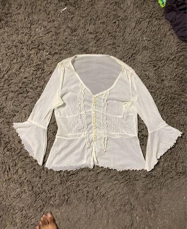 Weiße transparente Langarmbluse