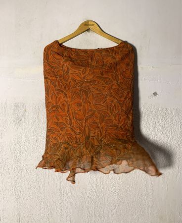 Rock mit Rüschensaum in Orange-Blatt-Druck