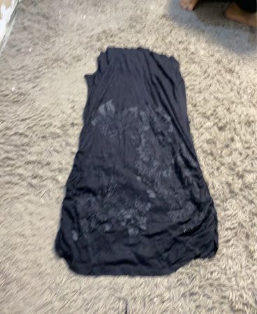 Schwarze ärmellose Tunika mit Blumenmuster
