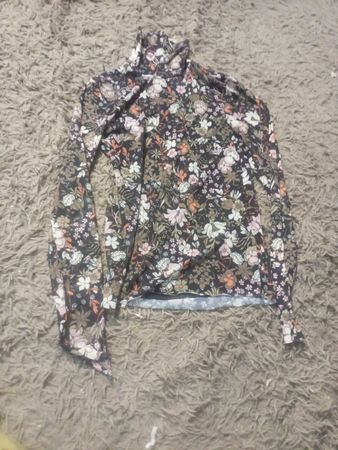 Blumendruck-Turtleneck-Oberteil