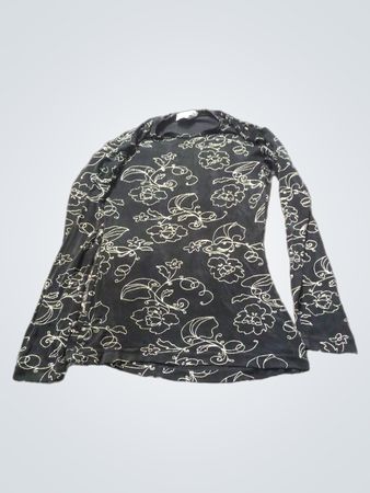 Chemise noire à manches longues avec imprimé floral blanc