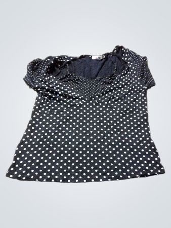 Schwarzes und weißes Polka-Dot-Oberteil