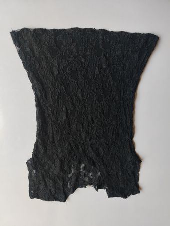 Schwarzes Spitzenstoffstück