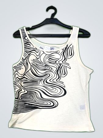 Women's sleeveless top with black and white design