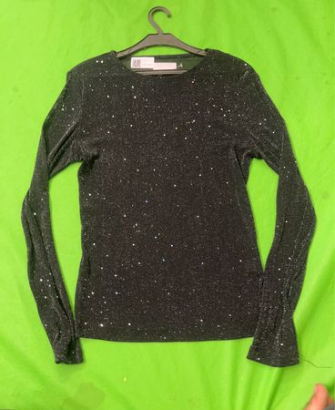 Glitzerndes schwarzes Langarmshirt